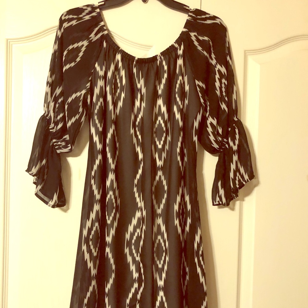 Black and white short dress.